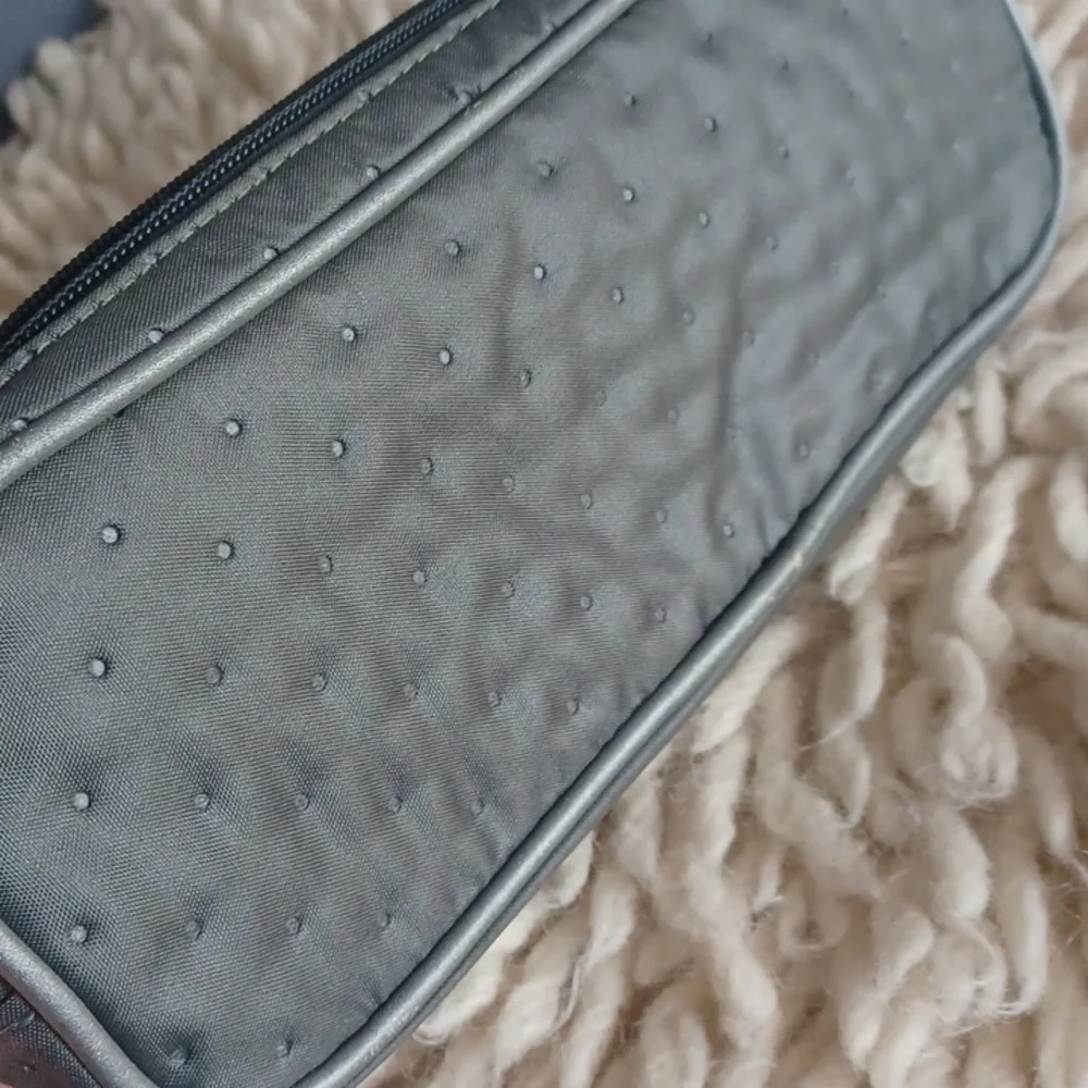 TUMI cosmetic bag
